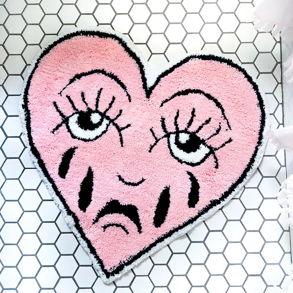 crying heart rug by a shop of things available at hey tiger louisville