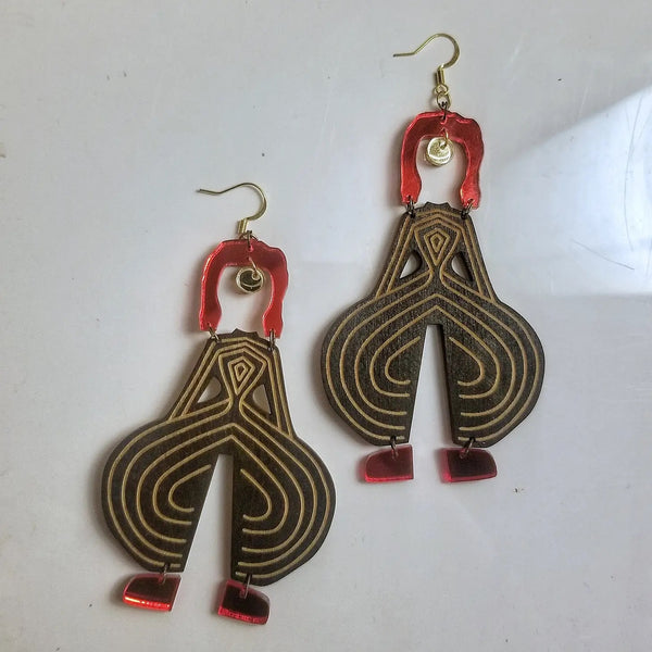 bowie inspired earrings by lost and found available at hey tiger louisville