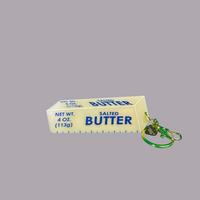 Salted butter keychain by a shop of things available at hey tiger Louisville 