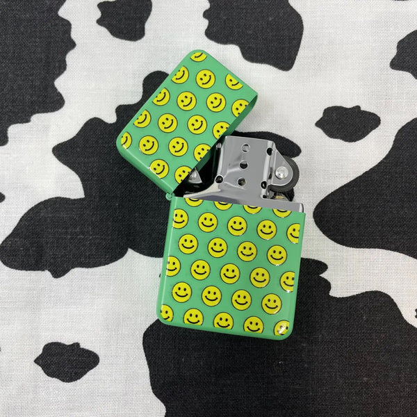 smiley face lighter by a shop of things available at hey tiger loiusville
