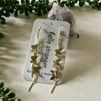 Y2K style butterfly waterfall earrings in gold // hello stranger