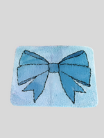 Coquette bow rug by a shop of things available at hey tiger Louisville Ky 