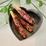 Hand rolled rose petal dipped palo santo wood 