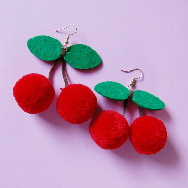 cherry pom pom earrings by a shop of things available at hey tiger louisville