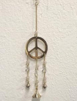 Peace wind chime available at hey tiger Louisville 